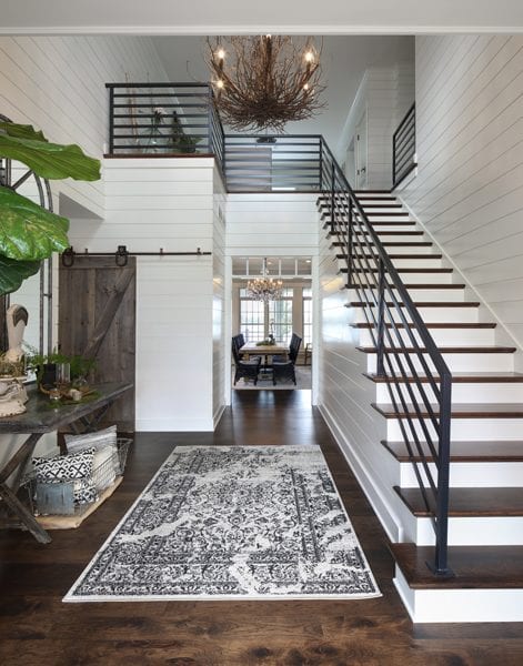 entryway with stairs leading upstairs
