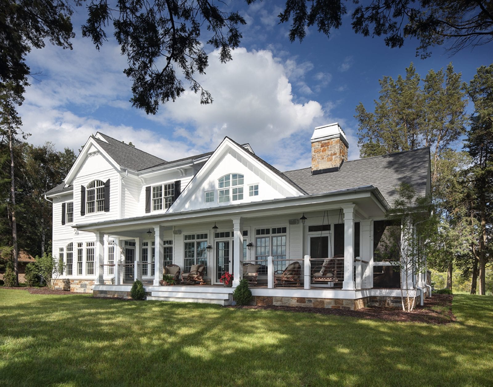 white home with a porch exterior