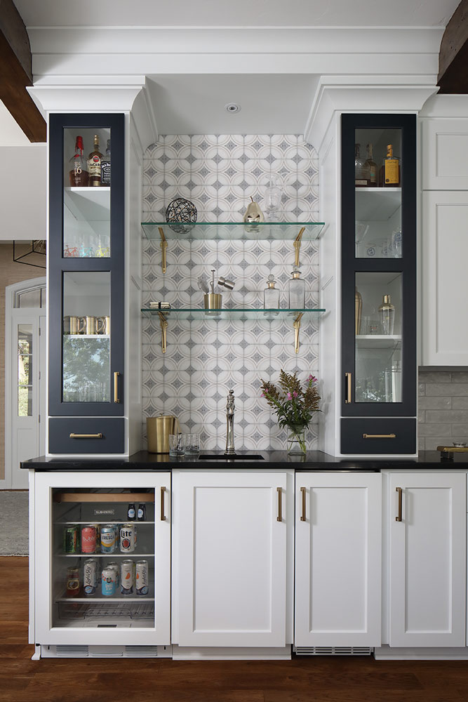 picture of a bar with glass shelves and cabinets