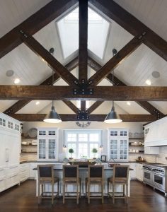 picture of white kitchen with wood detail