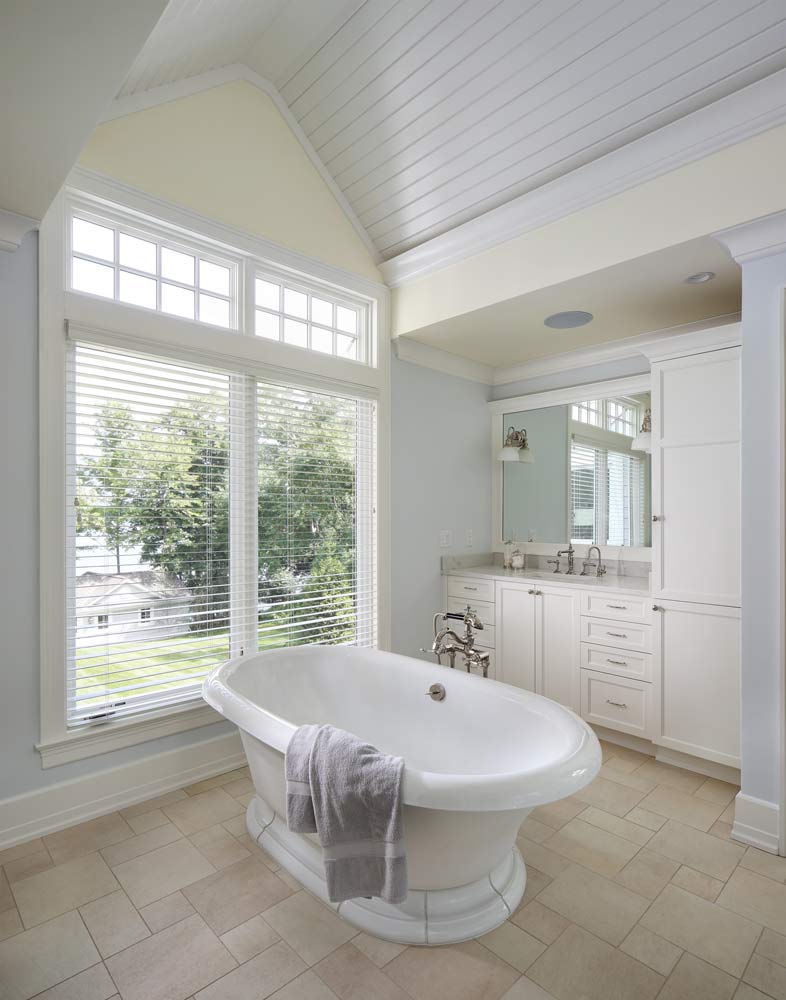 picture of a white bathroom with a bathtub