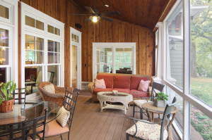 picture of a wooden porch with furniture