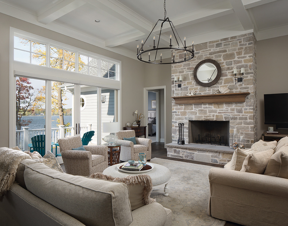picture of a living room with a stone fireplace