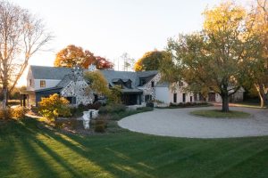 ExtFrontA0522 | Spring Maintenance for Your Custom Home: A Comprehensive Guide for (Lake) Homeowners